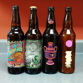 Art - These beers are supposedly really good... Trying to decide which bottle to pop first.