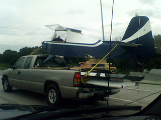 An airplane in a truck on i235
