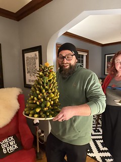Sandie Kirpalani - Carefully moving the pickle Christmas tree