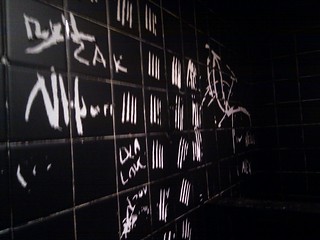 Markings on the Bathroom Wall at Sips
