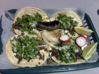 4 steak tacos and a pepper