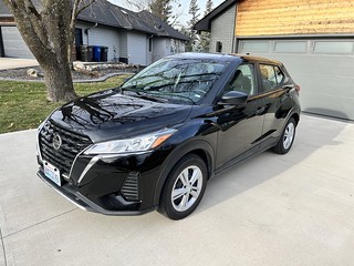 State Farm / Enterprise hooked it up with this lil baby sub-compact 4-door Nissan queef.