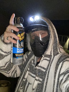 Bout to take out some big ol wasp nests... the poncho and paintball mask made me feel safer