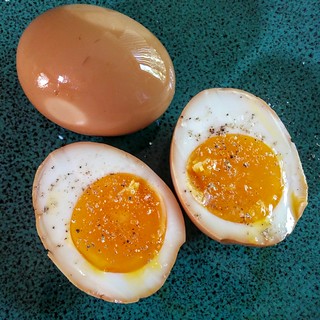 Soft boiled eggs. Marinated in soy sauce. Awesome.