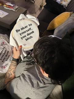 Kari is cross stitching