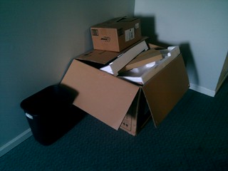 Red 5 - These boxes have sat here since we bought our new window AC - to cool the server room, haha