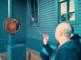 playing some weird human, cat toy, ring game