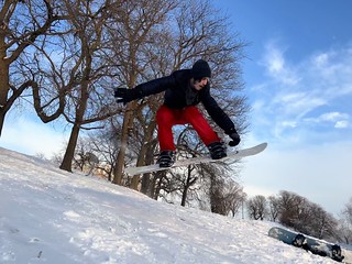 Snowboarding - Reachin for that nose