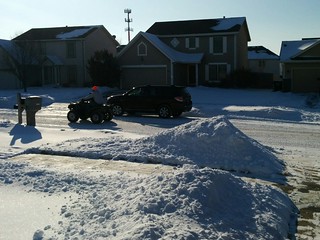 Snow - Four wheelers cruisin through suburbia. Iowa stuff.
