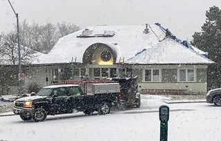 Snow - Neighbors picked a great time to replace their roof