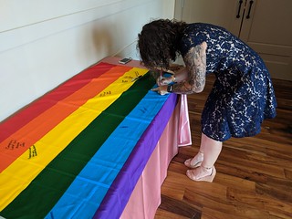 Wedding - Signin the wedding flag