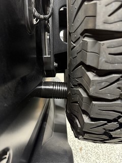 These Barnes 4x4 bumpstops are way better than the ones I made out of old JK bumpstops. I wish I had a tire carrier that sucked the wheel in closer to the body though.