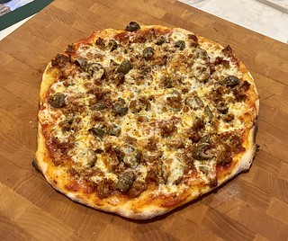 pizza - Nearly every ingredient of this pizza is from Grazianos. 00 flour, sauce, sausage, pepperoni, oli...