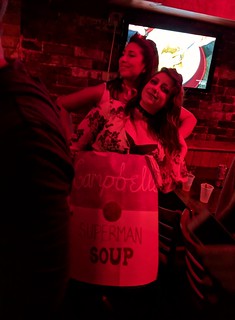 Abby tries on a soup can