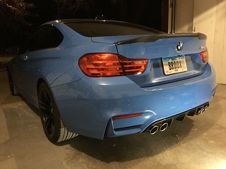 Back: with a carbon lower diffuser and spoiler