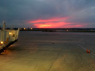Sunset - Havin an airport burger. Lookin at this.