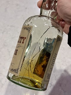 Drinks - I’m guessing this side of the bottle hit the base of the other when I set it down. Boom. 2 full...