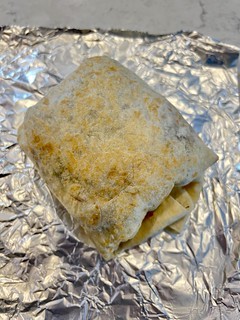 The burrito lady folded my burrito up like a softball