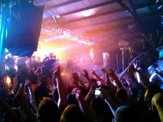 Fans on stage. Raining Faygo