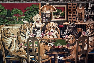 Art - Coffey has one of those wall mounted rugs of dogs playing cards n stuff