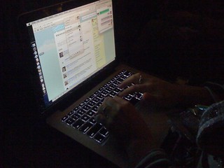 Tech - Kari staying connected at 30,000 feet.