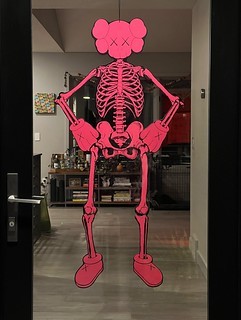 Art - Halloween KAWS skeleton hung in the doorway