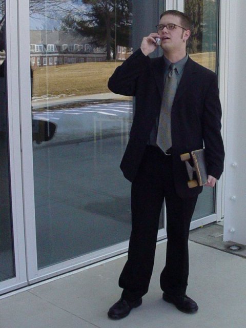 Skateboard, Suit, and Cell phone - 2 of these things were often seen with me in college - the other was only for court dates.