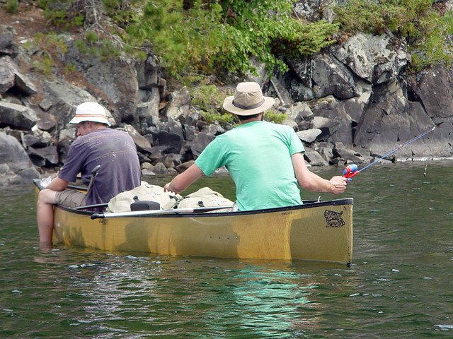 Josh fishing with a Spiderman fishing pole