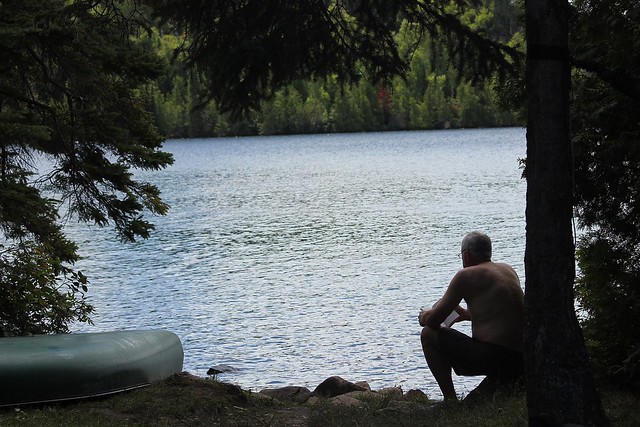 Cal reading by the lake