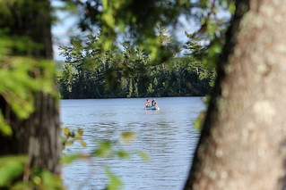 Another group paddles by
