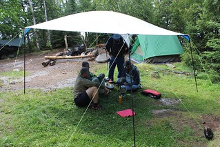 Waiting out some weather under Cal's rain tarp.