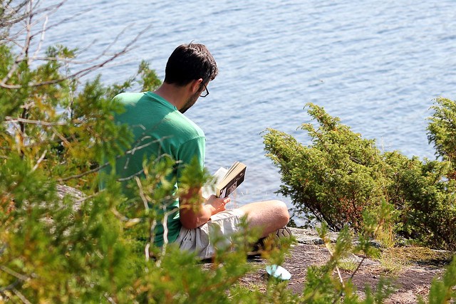 Josh reading on our island at Little Sag