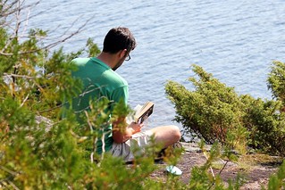 Josh reading on our island at Little Sag