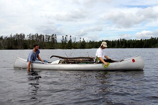 Will Baumann - Dippin water bottles for fresh lake water