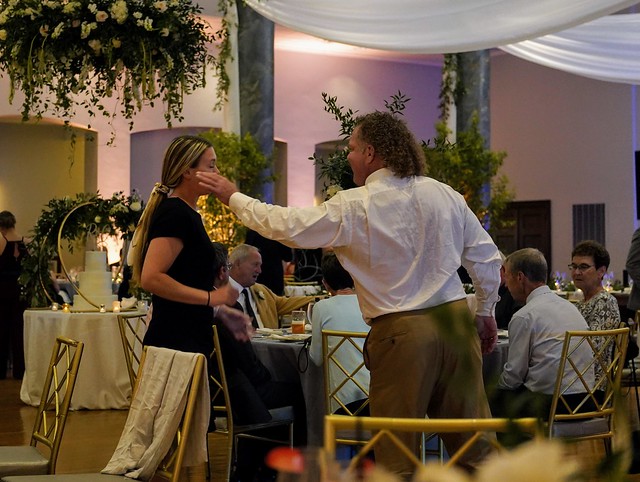 This beautiful mullet man was not slapping that woman. But it sure looks like he was.