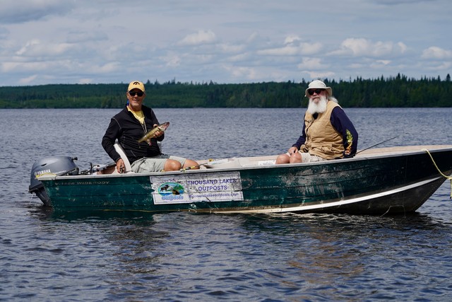 Jim pulls in another walleye