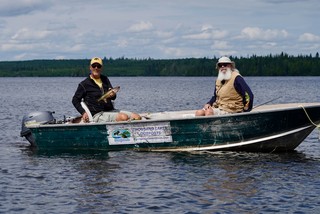 Jim pulls in another walleye