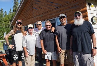Some dudes that just caught a bunch of fish