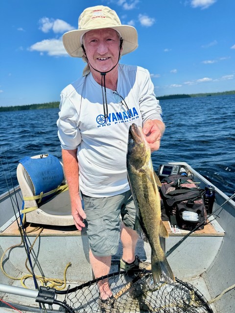 Dave pulls in a 23.5" walleye