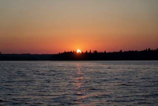 Sunset - Sun dips into the trees