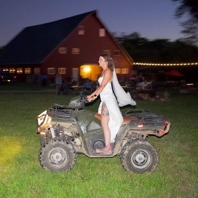 You just don't see enough women riding 4-wheelers in wedding gowns