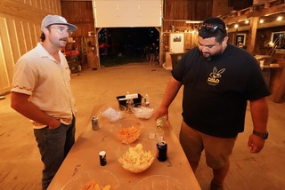 Drinks - Danny handin out samples to Casey