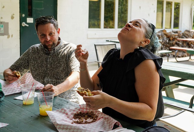 Tryin to take a photo while eating loose meat sandwiches