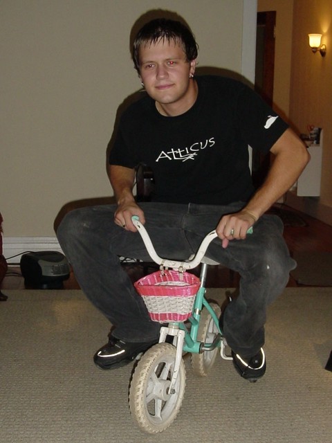Riding a little girl's bike around the Apt