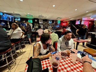 Maurizio - Dodging the rain at the Billy Goat