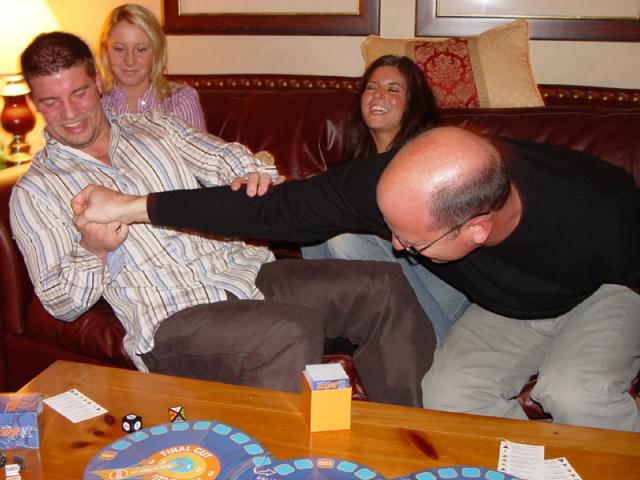 Thumb wrestling to settle a dispute