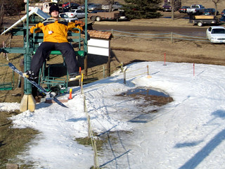 Snowboarding - Riding the Lift Up at Mount Kato