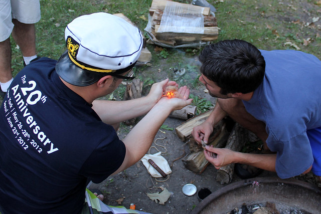 Making fire with flint and rope