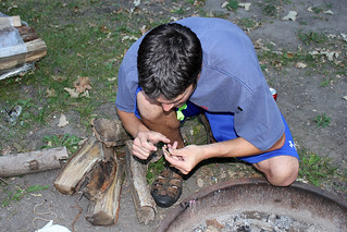Making fire with flint stone 