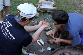 Making fire with flint and rope